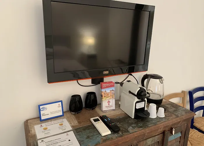 Pensión Tiburtina Suites, 3*